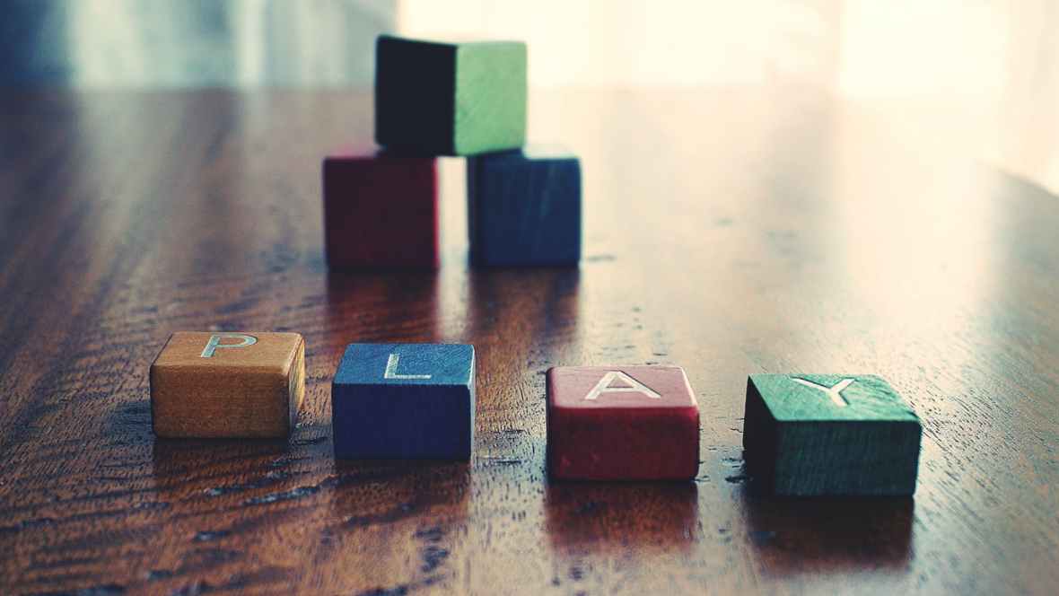 depth of field photograph of block toys